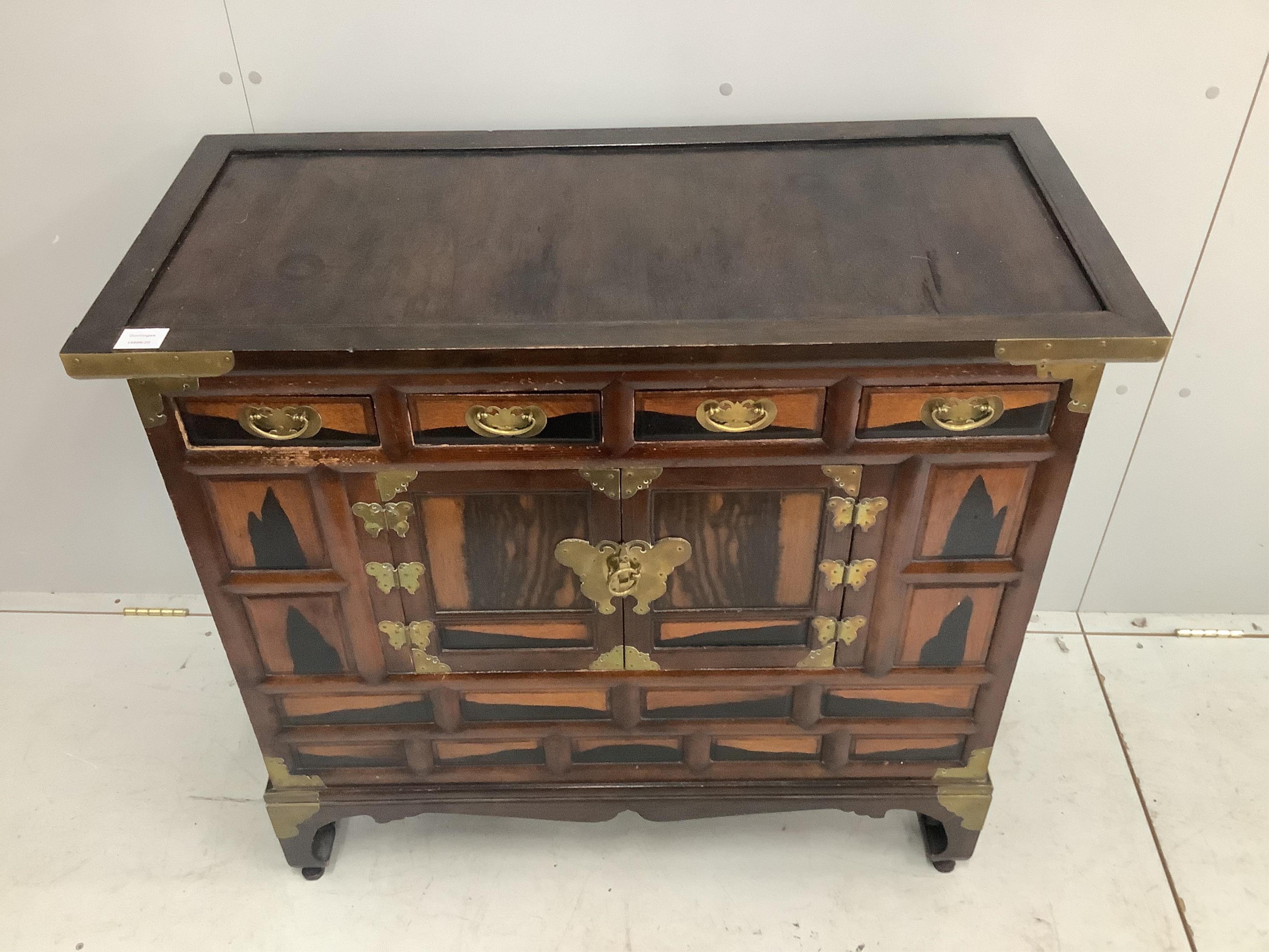 A Japanese or Korean persimmon wood (?) Tansu chest of drawers, width 98cm, depth 45cm, height 88cm. Condition - fair to good